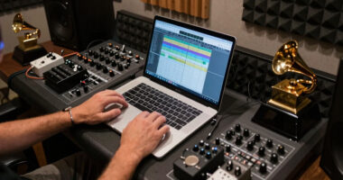 Grammy winner backs band dropped over Satanic beliefs, imagery